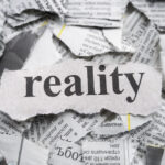 Tidningsutklipp med texten reality